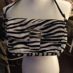 Woman’s faux fur Zebra print purse